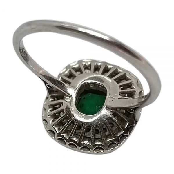 Prsten od platine s dijamantima i smaragdom